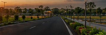 Landscaped project road at sunset from the supplied reference